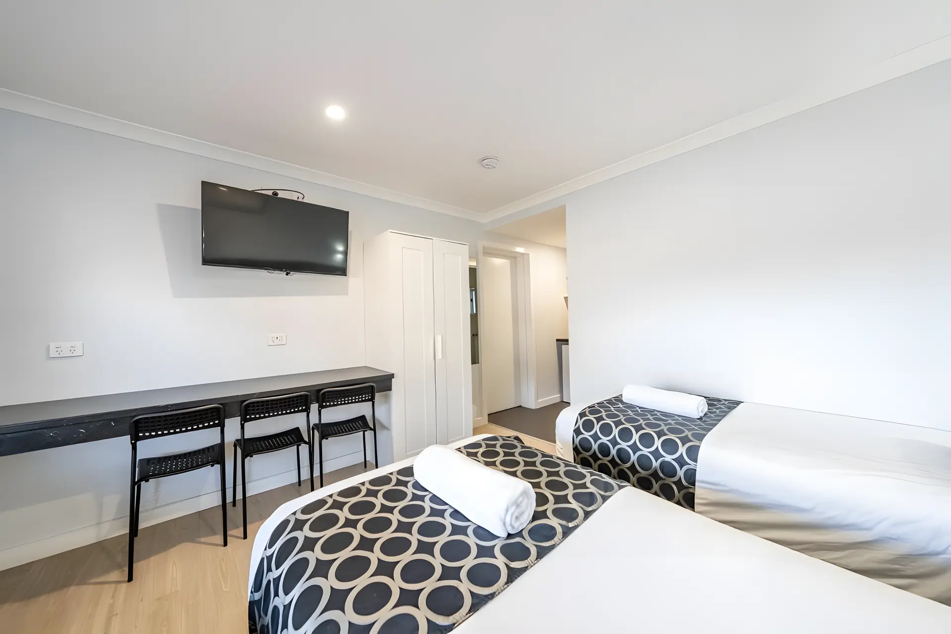 One-Bedroom King + 3 Singles With Kitchenette